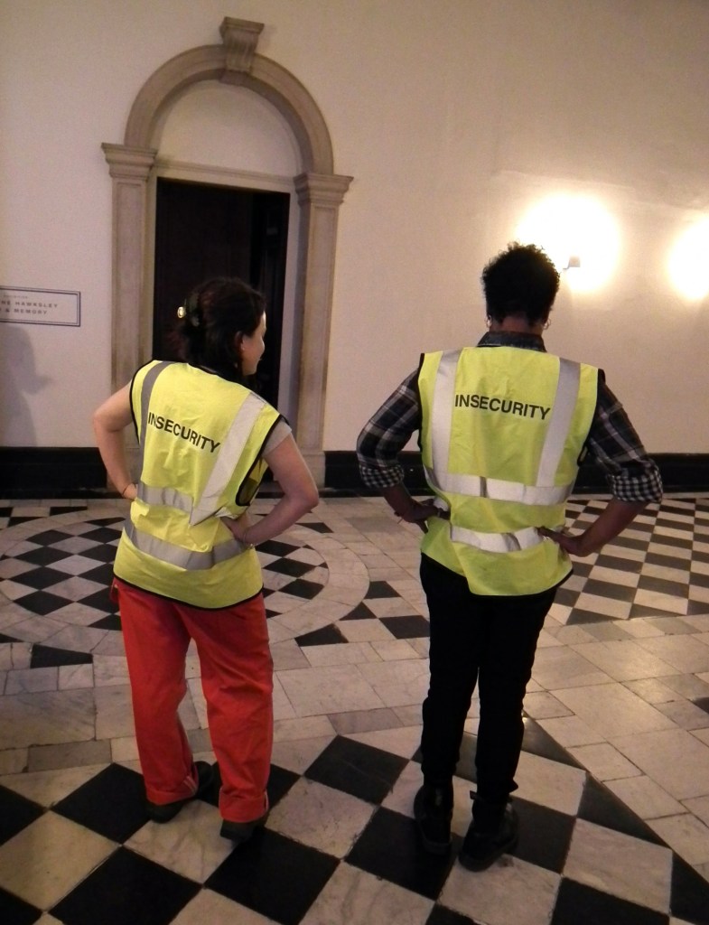 'Over Time project assistants at the museum: Sandra Louison and Stephanie Dickinson. 'Insecurity' jackets by Margareta Kern, 2014
