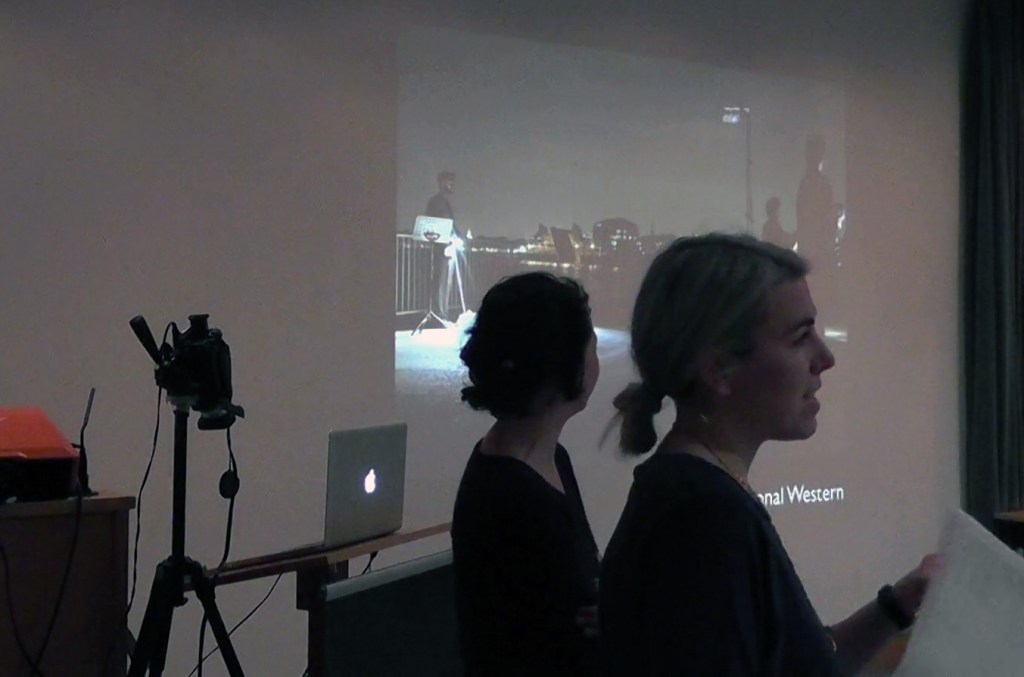 Ella Finer and Flora Pitrolo from The International Western talking about 'Calling All', performance with Morse code and lights, 2014