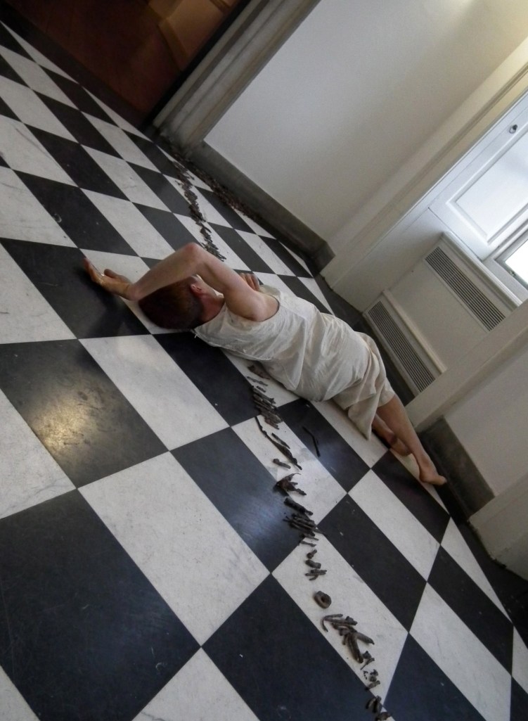 'Jetsam', Rachel Gomme, performance with metal debris, 2014